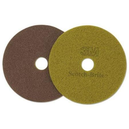 A pair of brown and green pads for polishing.