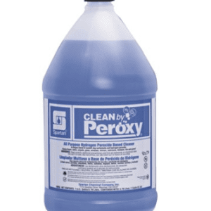 A blue bottle of cleaner is sitting on the floor.