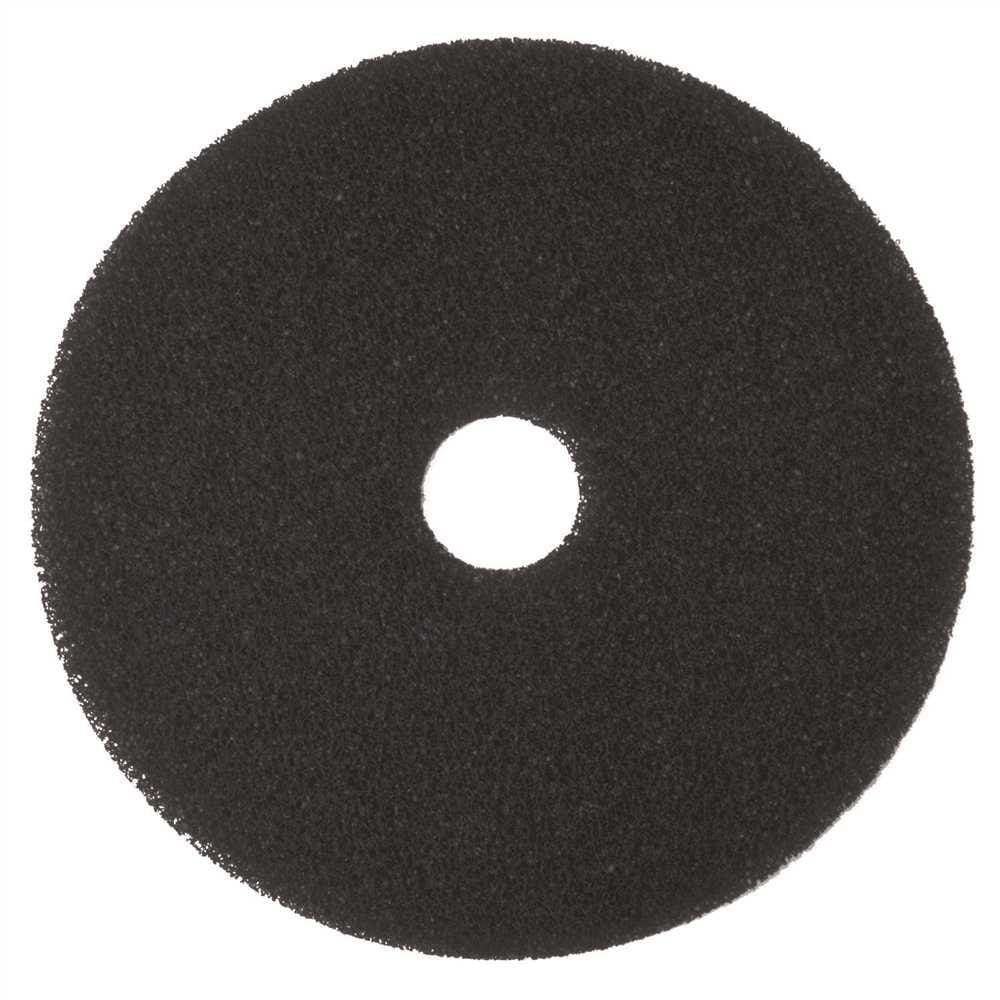 A black circular pad is shown on top of a white background.