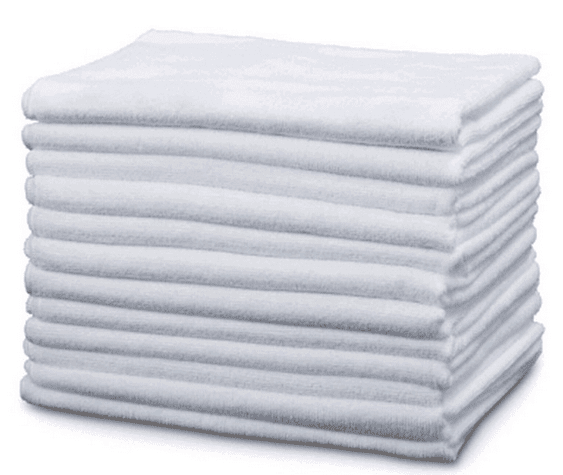 A stack of white towels on top of each other.