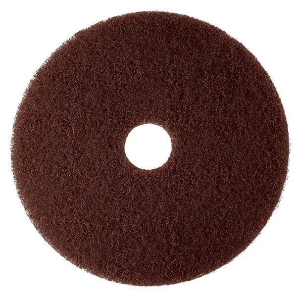 A brown circular pad is shown on top of a white background.